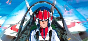 An anime man wearing a red and blue fighter pilot outfit and helmet in the cockpit of a transforming robot in Super Dimension Fortress Macross.