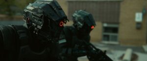 Scary robot cops with a red circle for an eye in Code 8 Part II