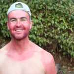 extremely red sunburned Summer tourist