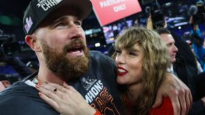 travis kelce and taylor swift embracing after the afc championship game