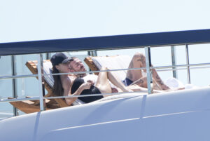 The Beckhams enjoy a day in the sun while relaxing on their £5m yacht