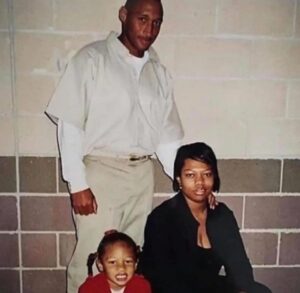 A young Megan Thee Stallion with her mother Holly Thomas and father Joseph Pete