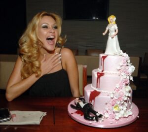 Shanna Moakler with the divorce cake she had made after splitting up with Blink-182 drummer Travis Barker.