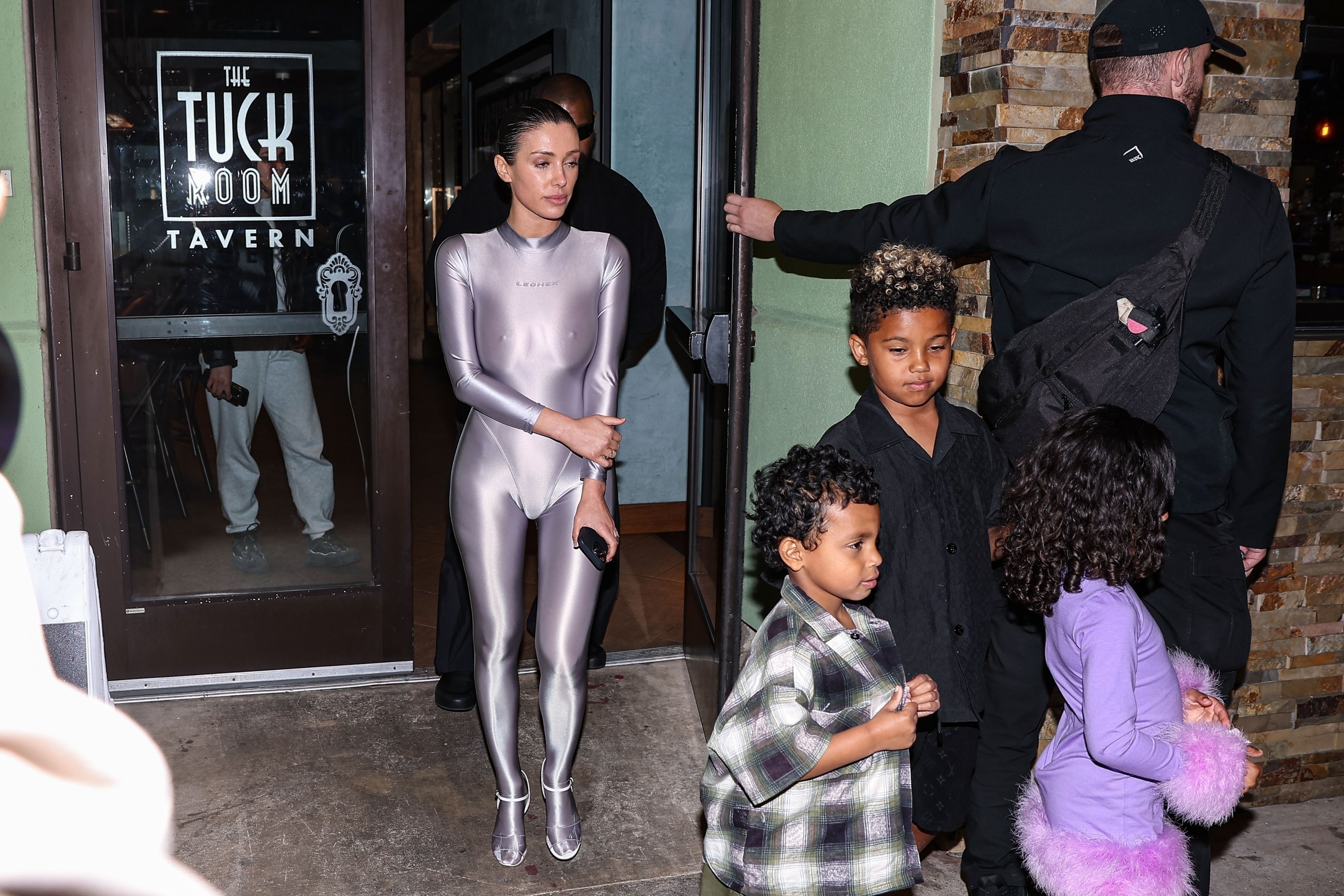The celebrity couple was seen leaving The Tuck Room in Los Angeles with three of the kids Kanye shares with his ex, Kim Kardashian