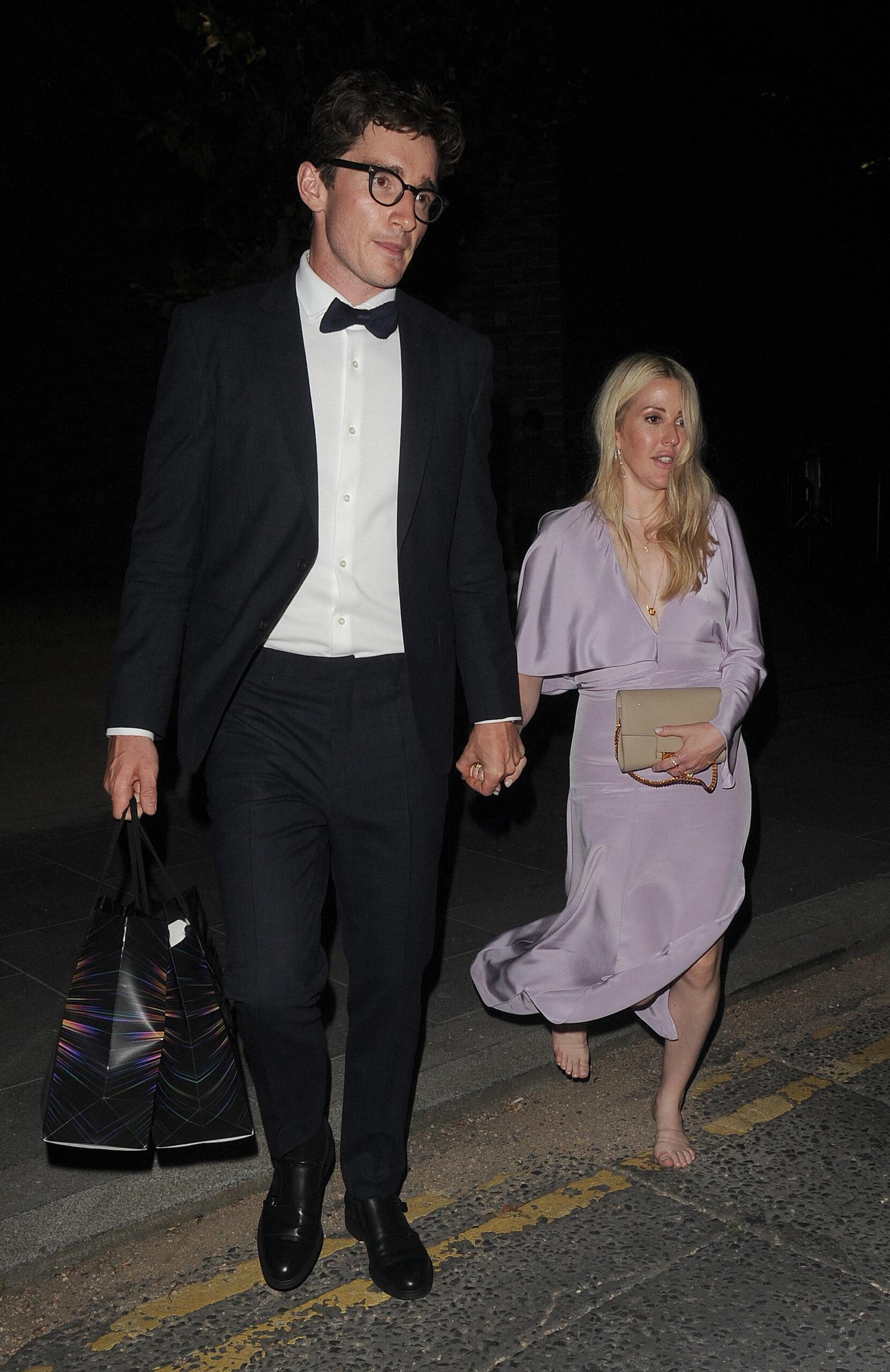 Ellie Goulding is seen walking barefoot, as she and her husband Caspar Jopling leave the GQ Man Of The Years Awards 2021
