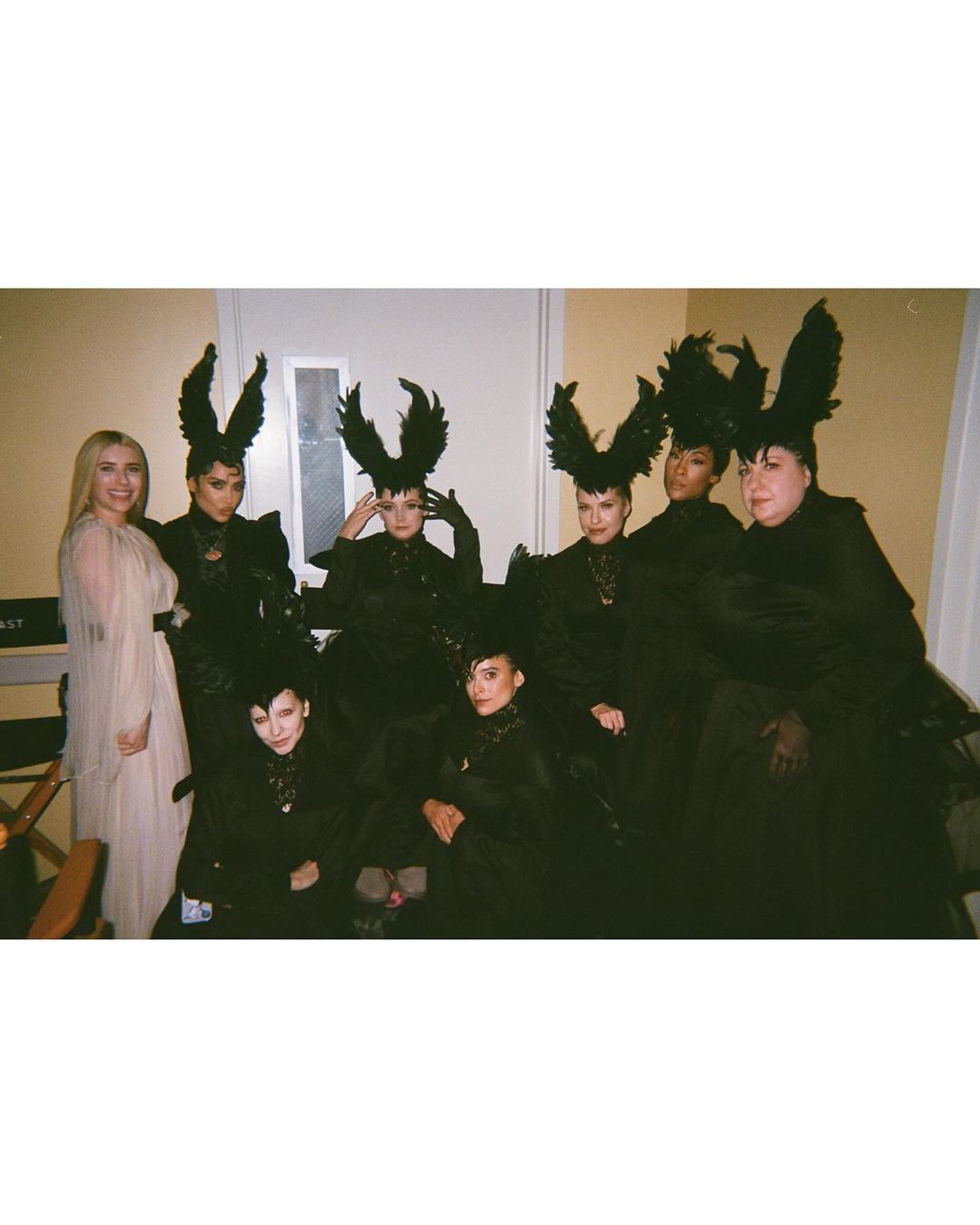 A backstage photo showed Kim, Kathy Bates, and several other castmates dressed up in the witches' garb while posing with Emma