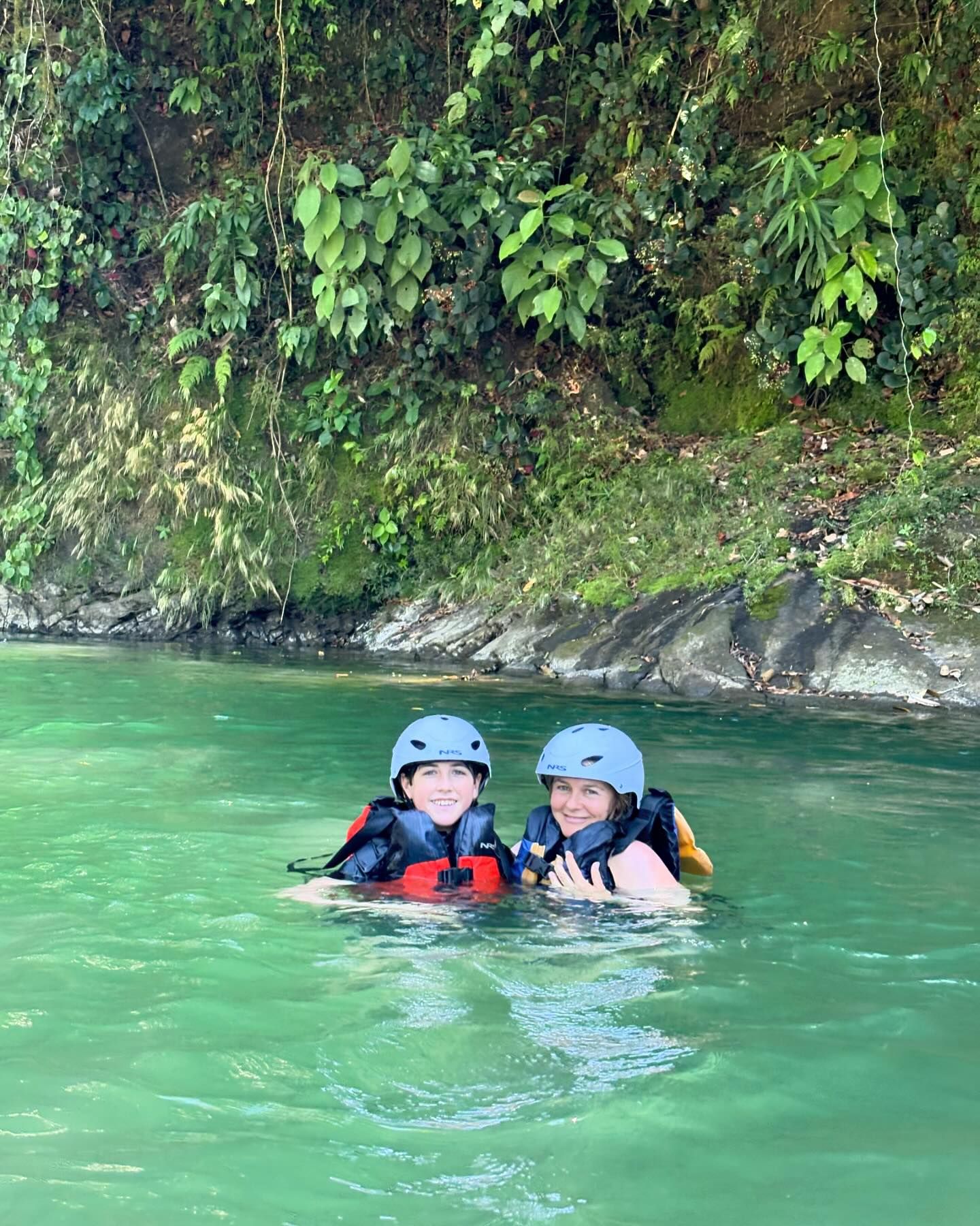 Alicia and her son Bear were life jackets as they floated in the water on their Costa Rica trip