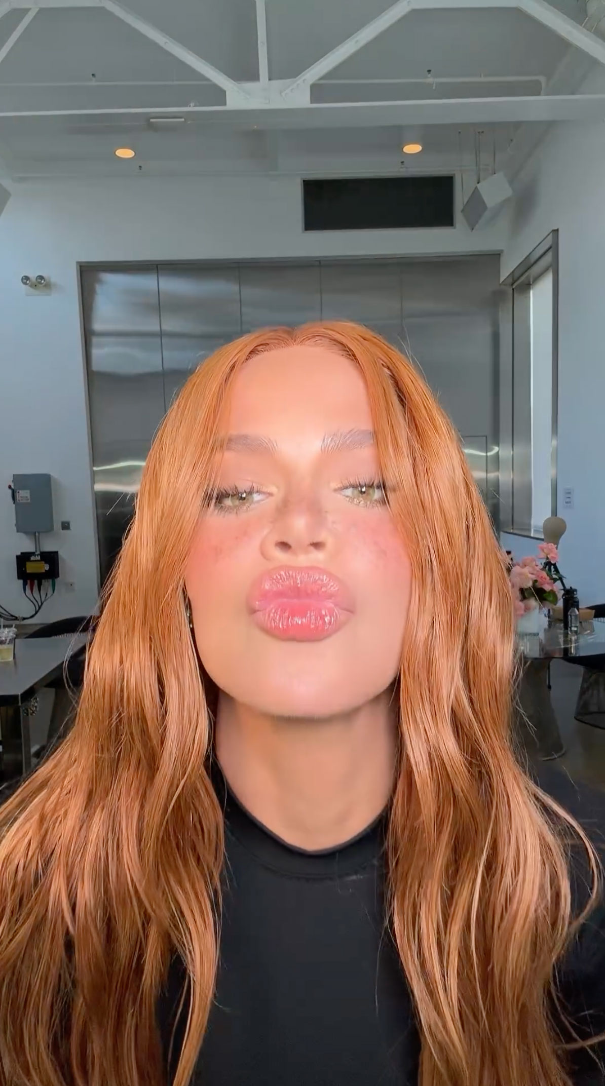 The Kardashian showed off her plump lips in the clip