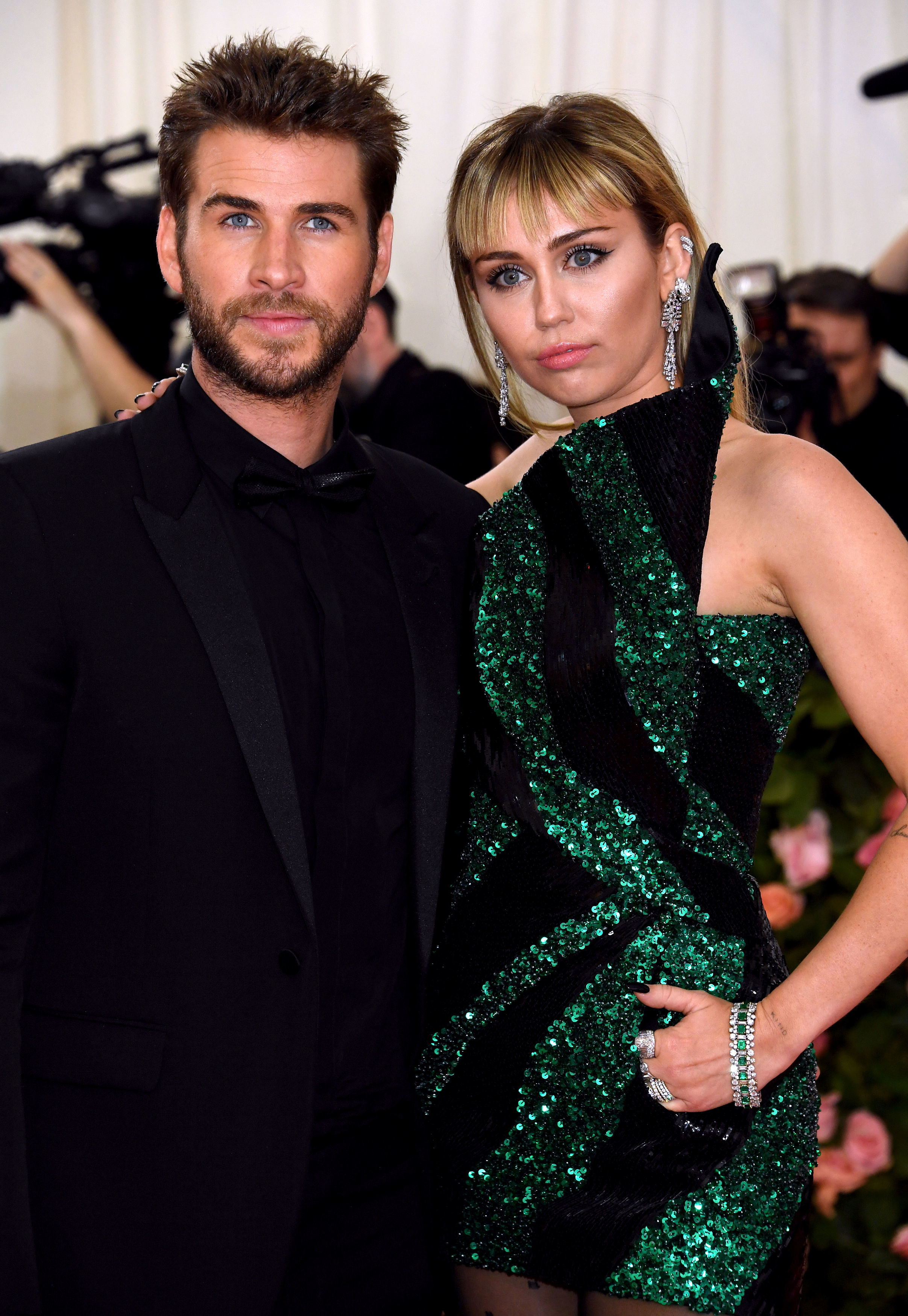 Liam and Miley posed together at an event in August 2019