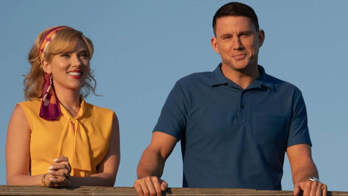 Scarlett Johansson and Channing Tatum standing outside on a pier in Fly me to the Moon