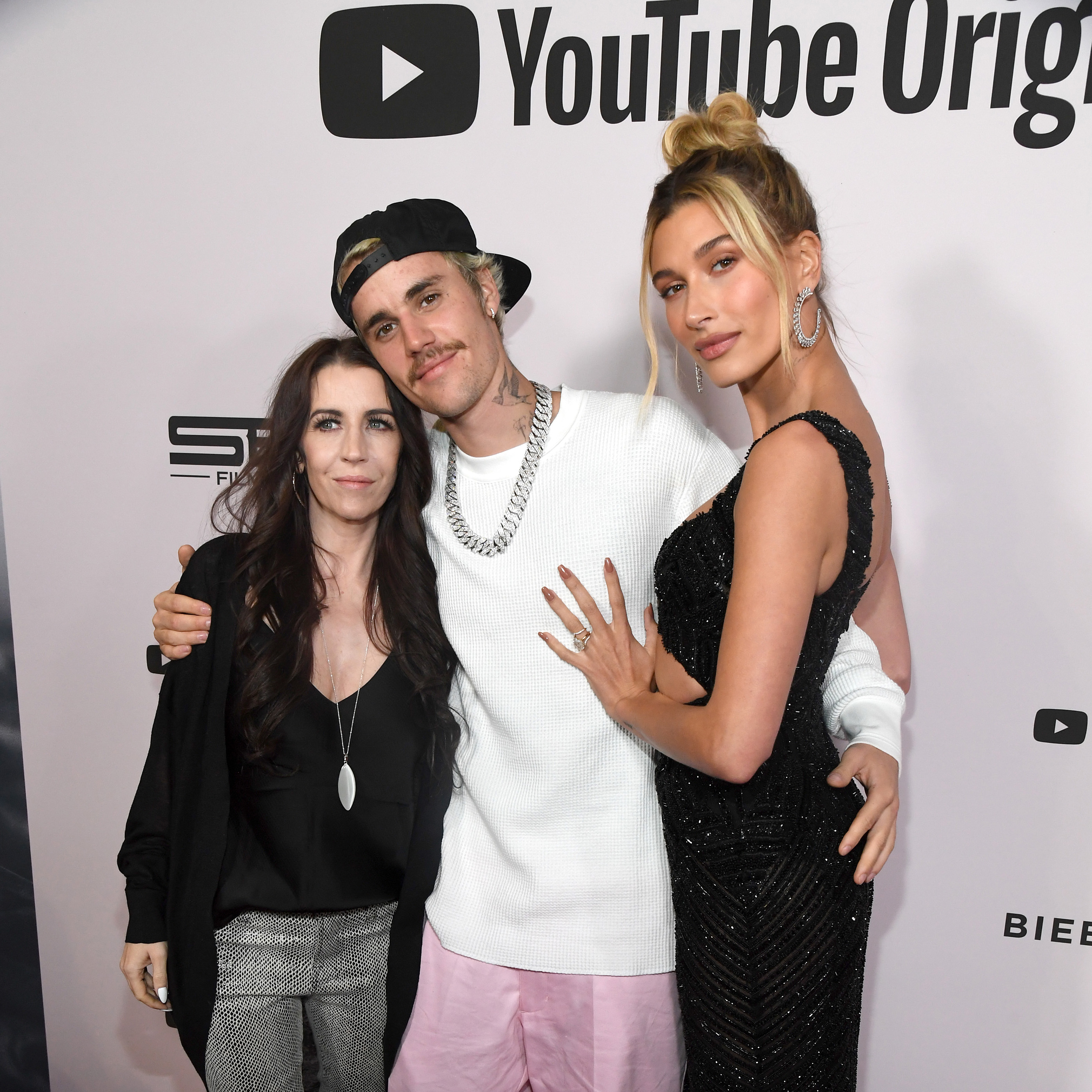 Hailey, pictured with her husband Justin and his mom Pattie, was recently accused of using Pattie's birthday as a way to cover up their marriage struggles