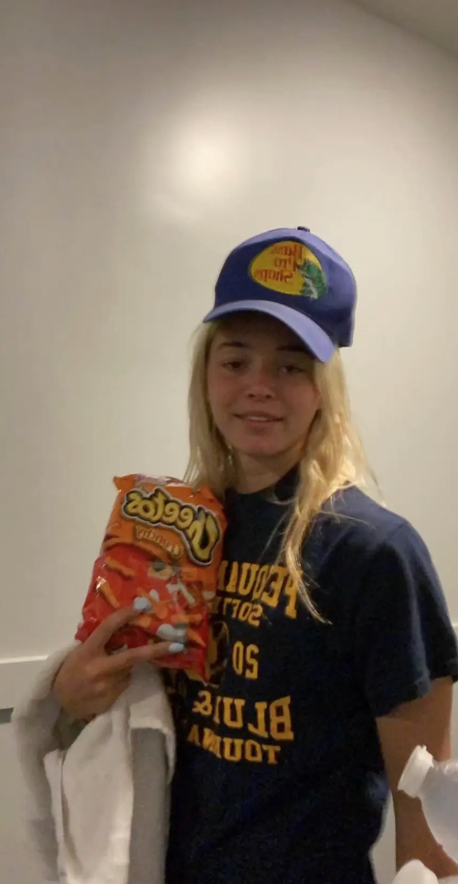 In one snap, Dunne could be seen in a relaxed outfit, enjoying a bag of crunchy Cheetos