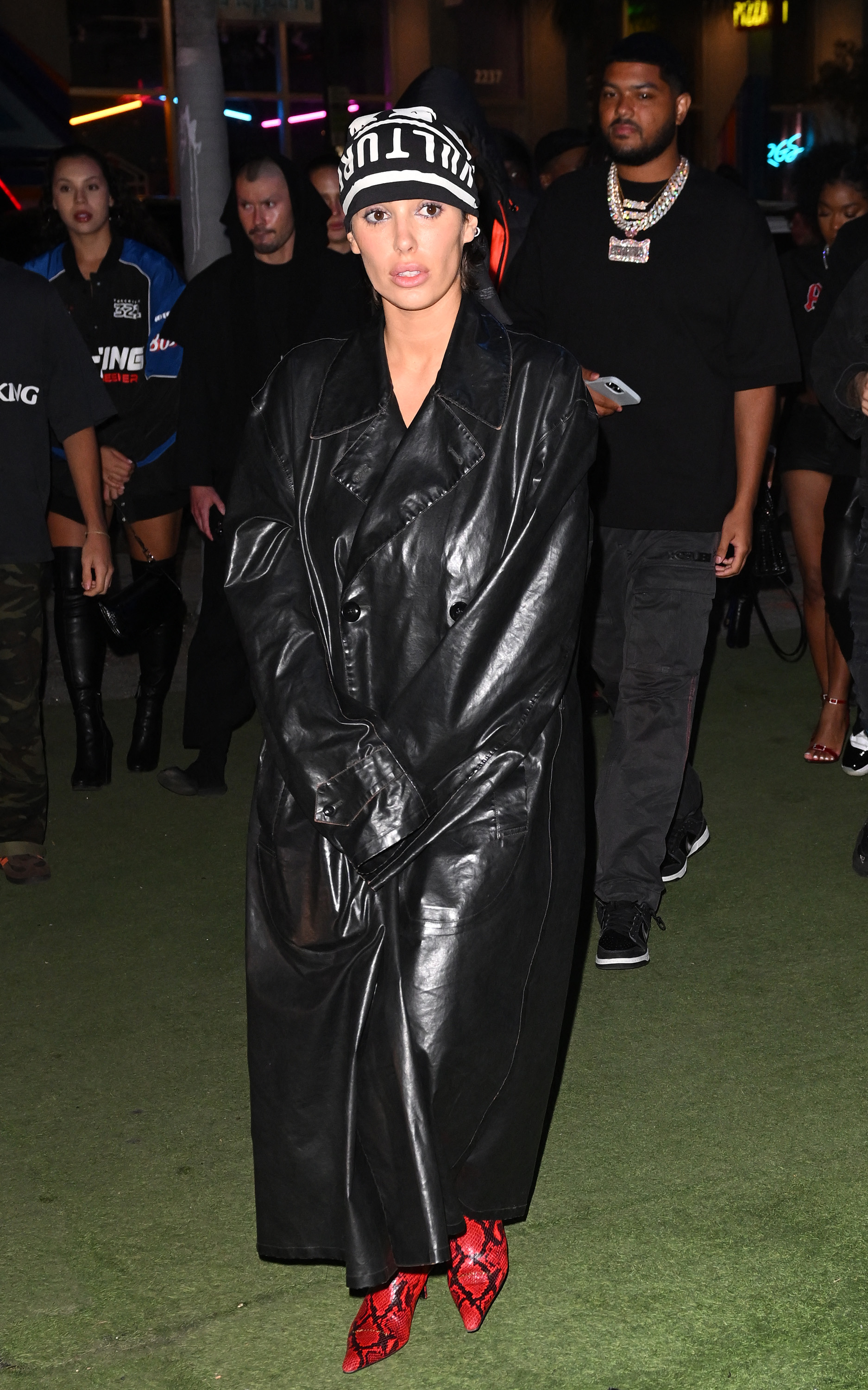 Kim's outfit appeared to be a copy of Bianca's oversized black trench coat