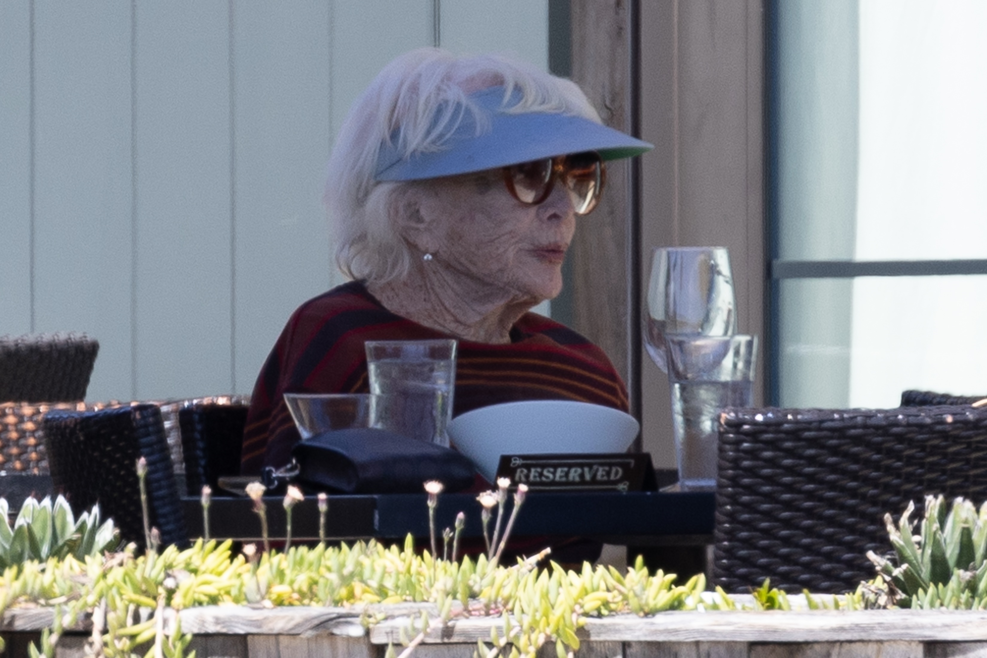 The Apartment actress was seated at a reserved table on the outside patio as she ate lunch and enjoyed a classic martini