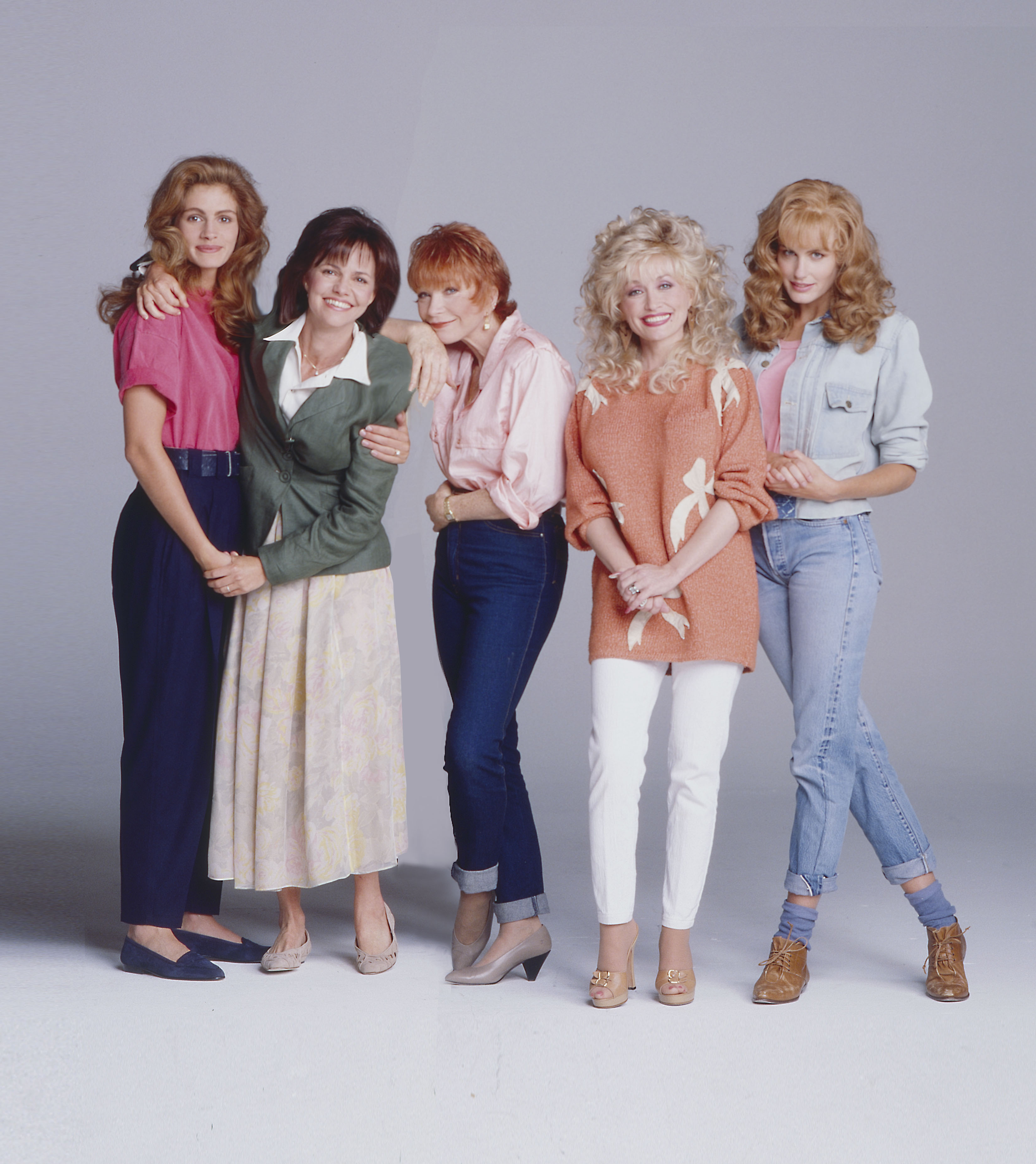 Shirley pictured with Julia Roberts, Sally Field, Dolly Parton, and Daryl Hannah in a promotional still for 1989's Steel Magnolias