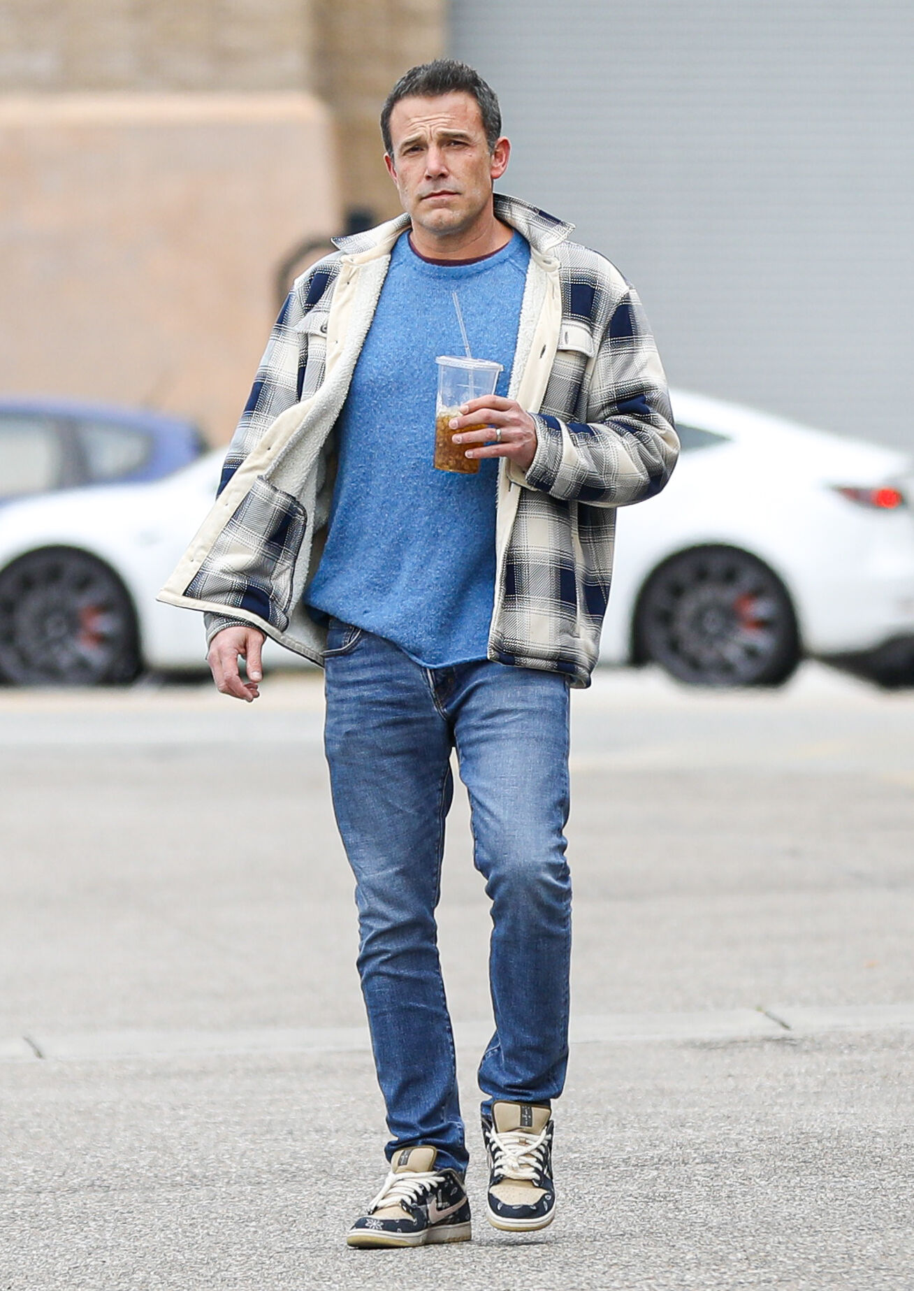 Fin was seen wearing a T-shirt paired with an oversized flannel and jeans while Ben rocked a similar look