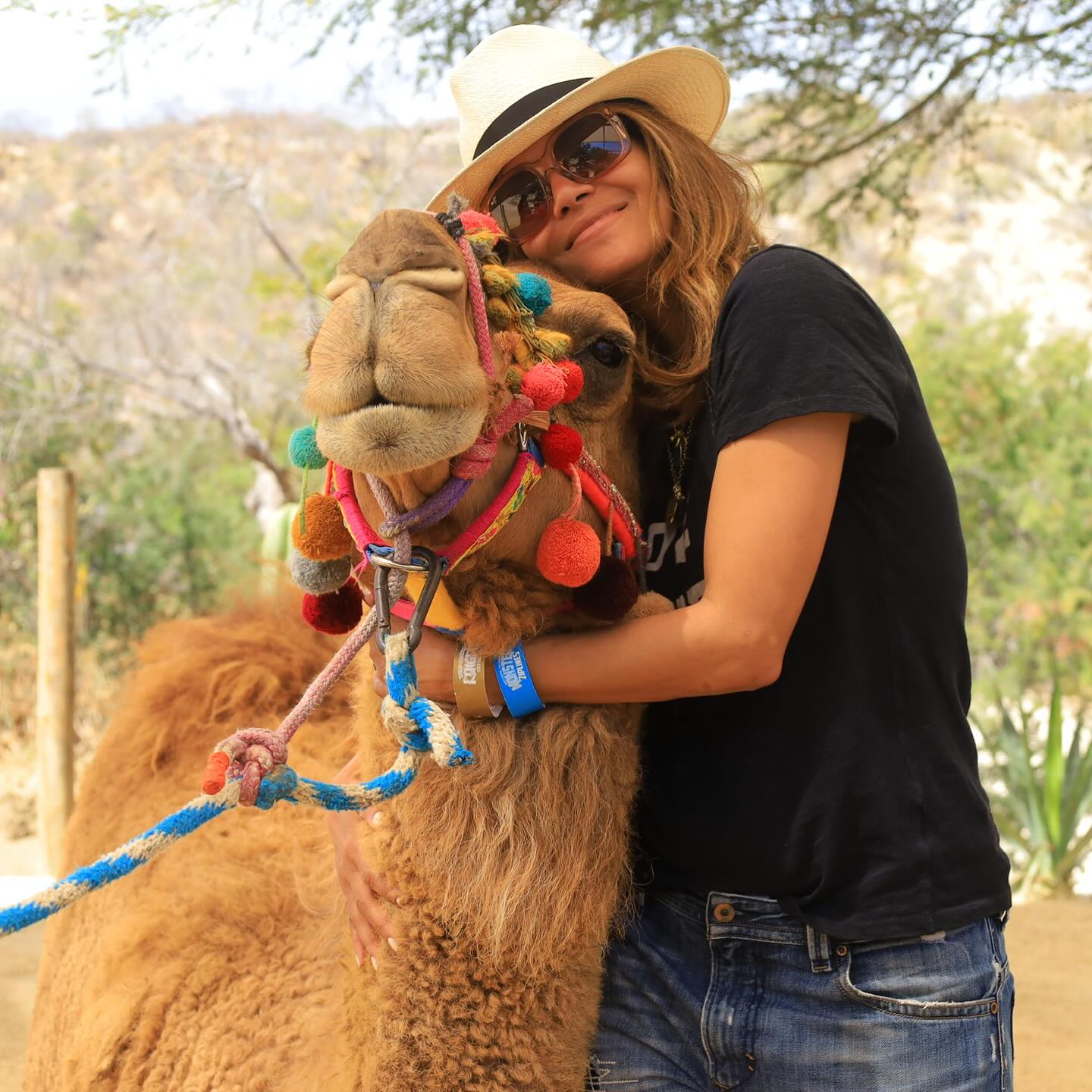 Halle shared sweet photos with a camel in Mexico