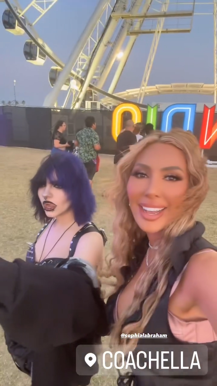 Farrah and Sophia posed in front of the Ferris Wheel at Coachella