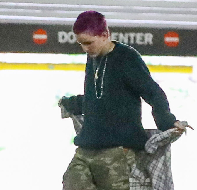 The outing showed Fin debuting their purple-colored buzzcut after recently announcing their official name change