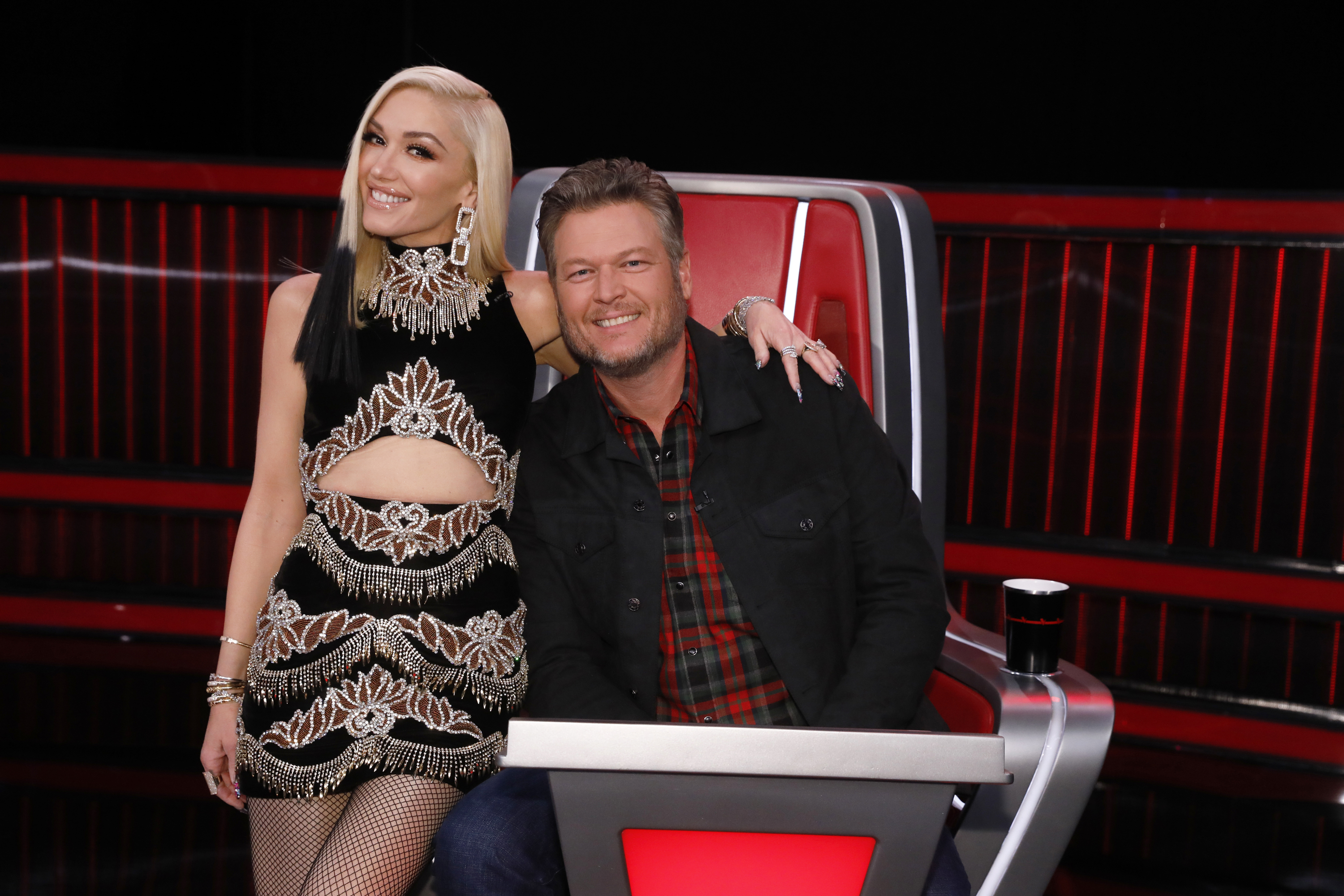 Gwen Stefani pictured with her husband Blake Shelton  on the set of The Voice in May 2021