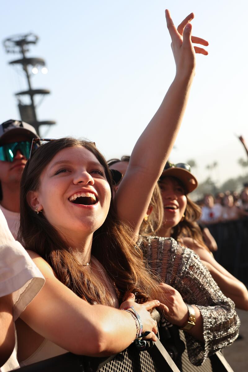 Fans watch Sabrina Carpenter perform at Coachella.