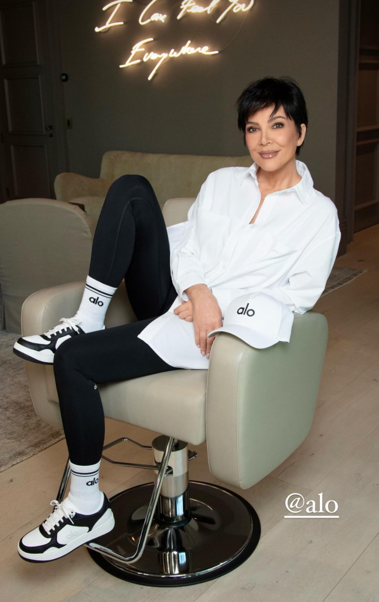 Kris looked lean in her Alo black leggings, and a loose-fitting white button-down shirt