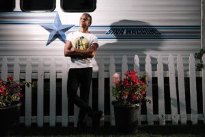 Man standing in front of a trailer