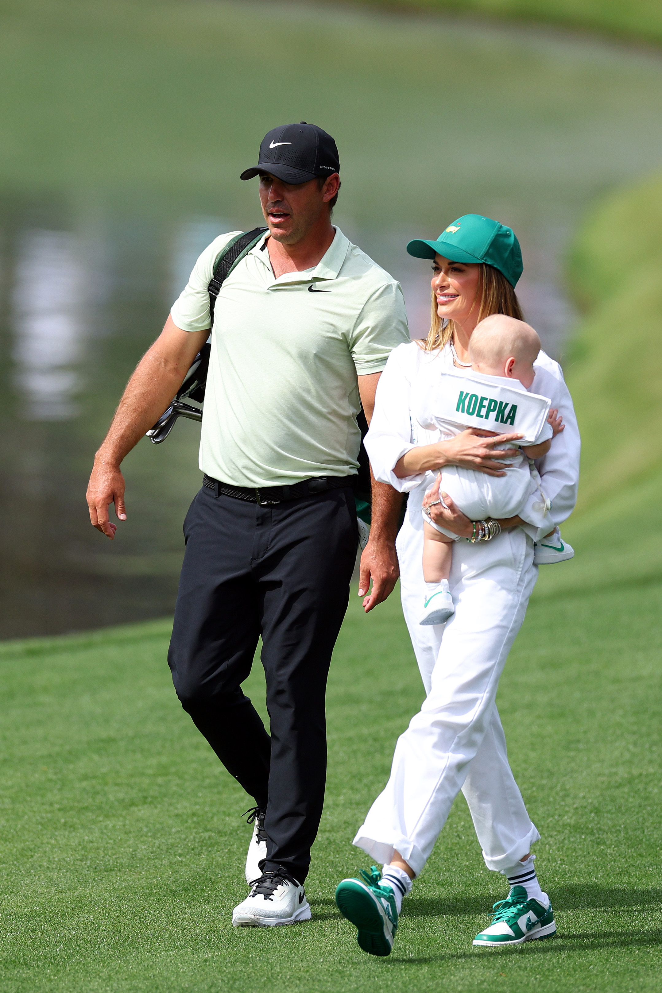 Brooks Koepka and Jena were at Augusta with their son