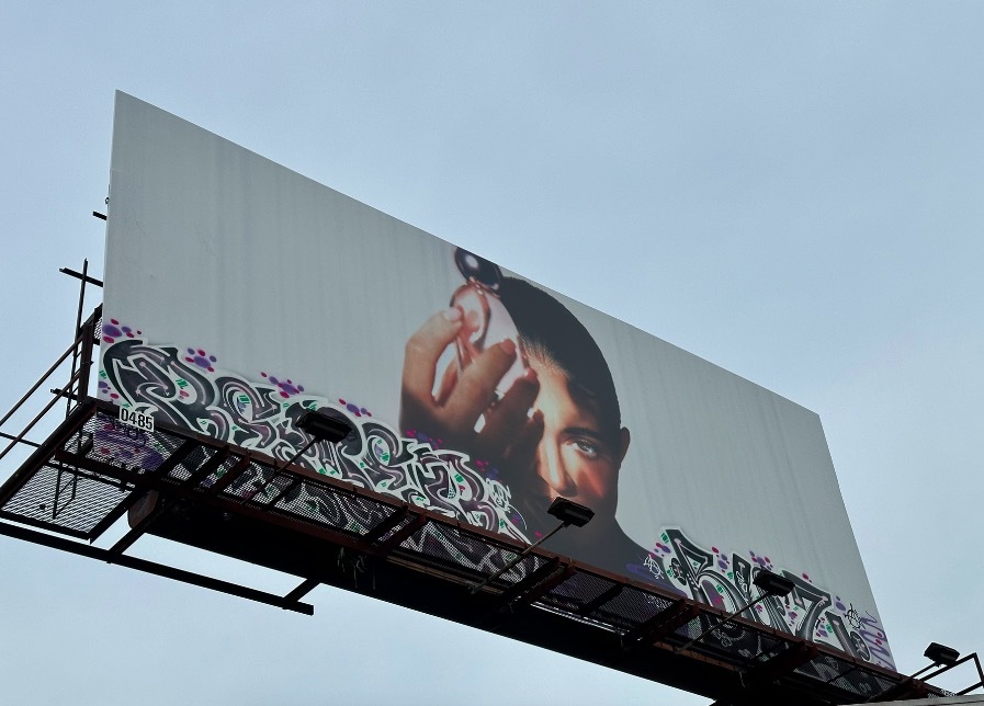 The billboard promoted Kylie's new perfume Cosmic