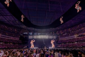 Taylor Swift is seen on massive video screens during her Eras Tour at SoFi Stadium in Inglewood