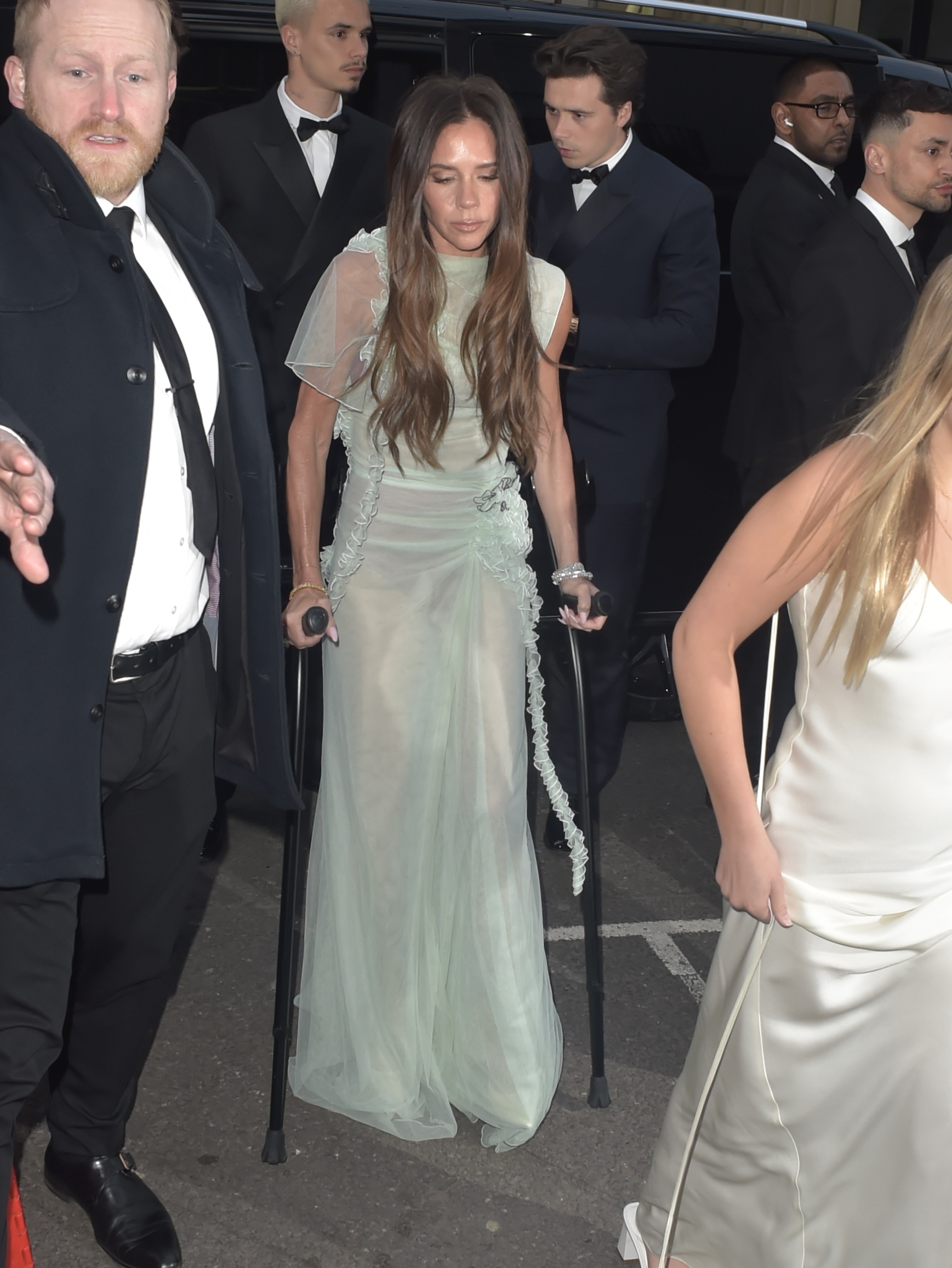 Victoria arrived at the expensive do on crutches after recently breaking her foot