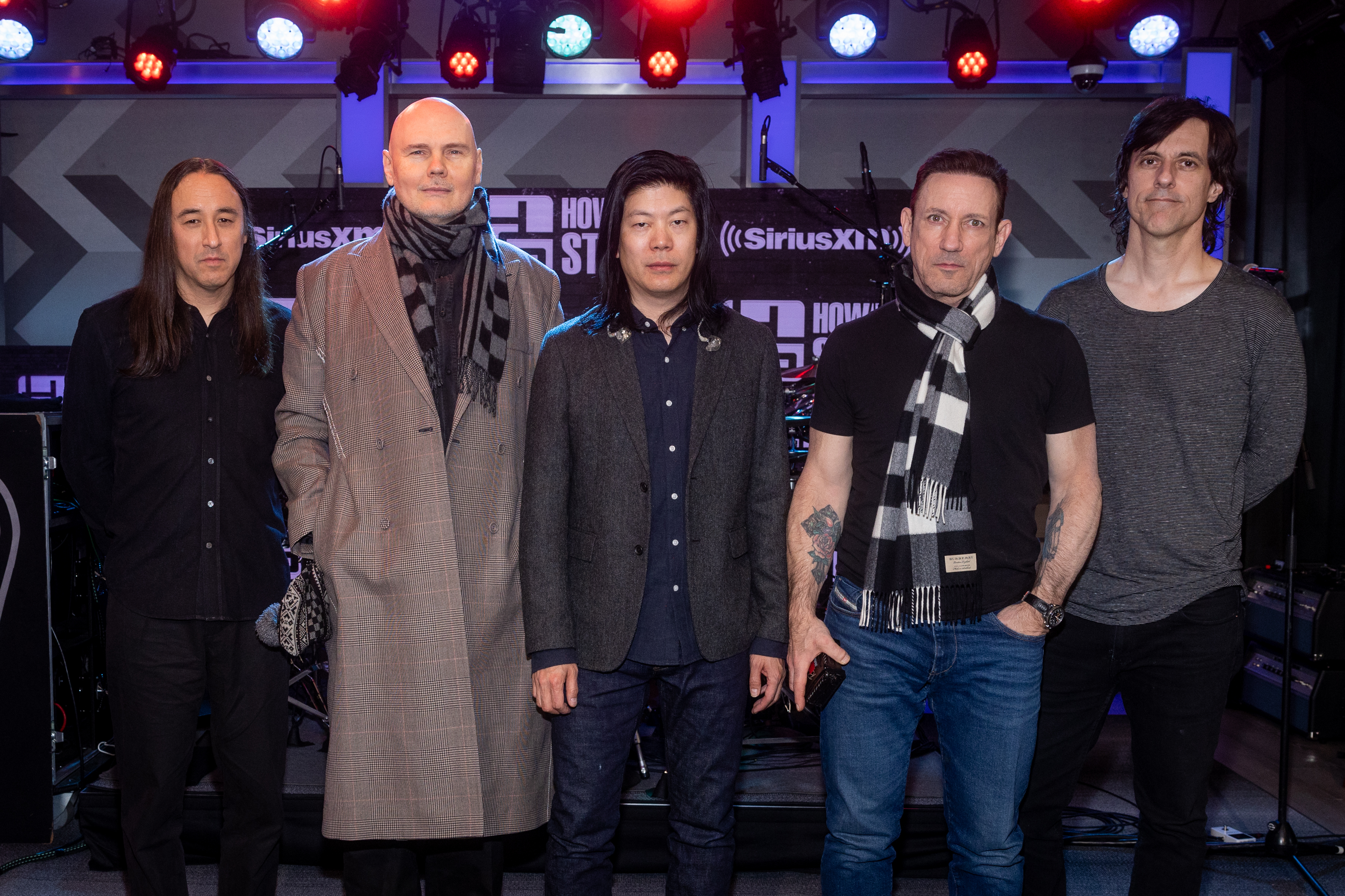Jeff Schroeder, Billy Corgan, Jimmy Chamberlin, James Iha, and Matt McJunkins of the Smashing Pumpkins visit The Howard Stern Show on March 28, 2023, in Los Angeles