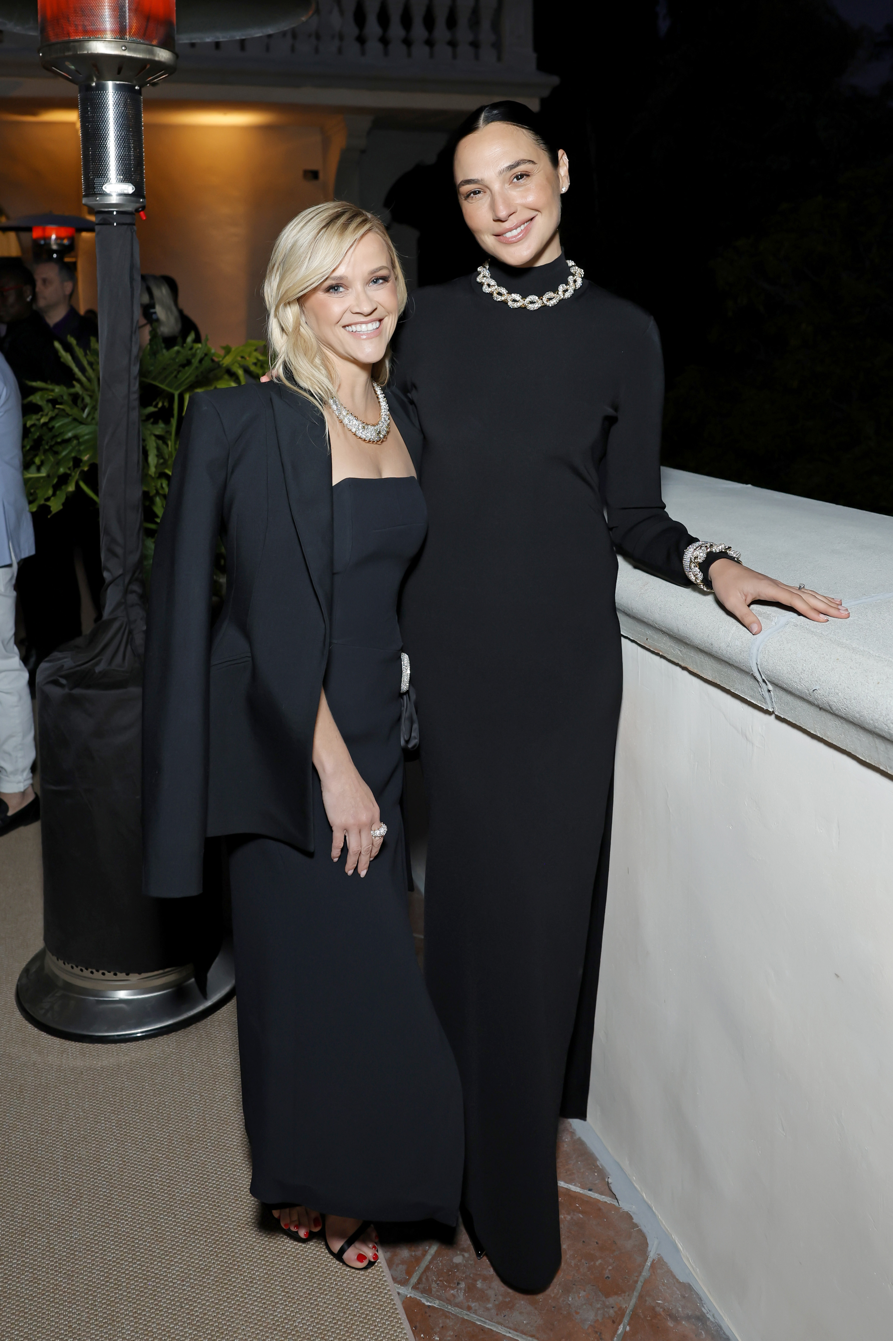 Reese smiled at the camera as she posed with Gal Gadot at the Tiffany & Co. event