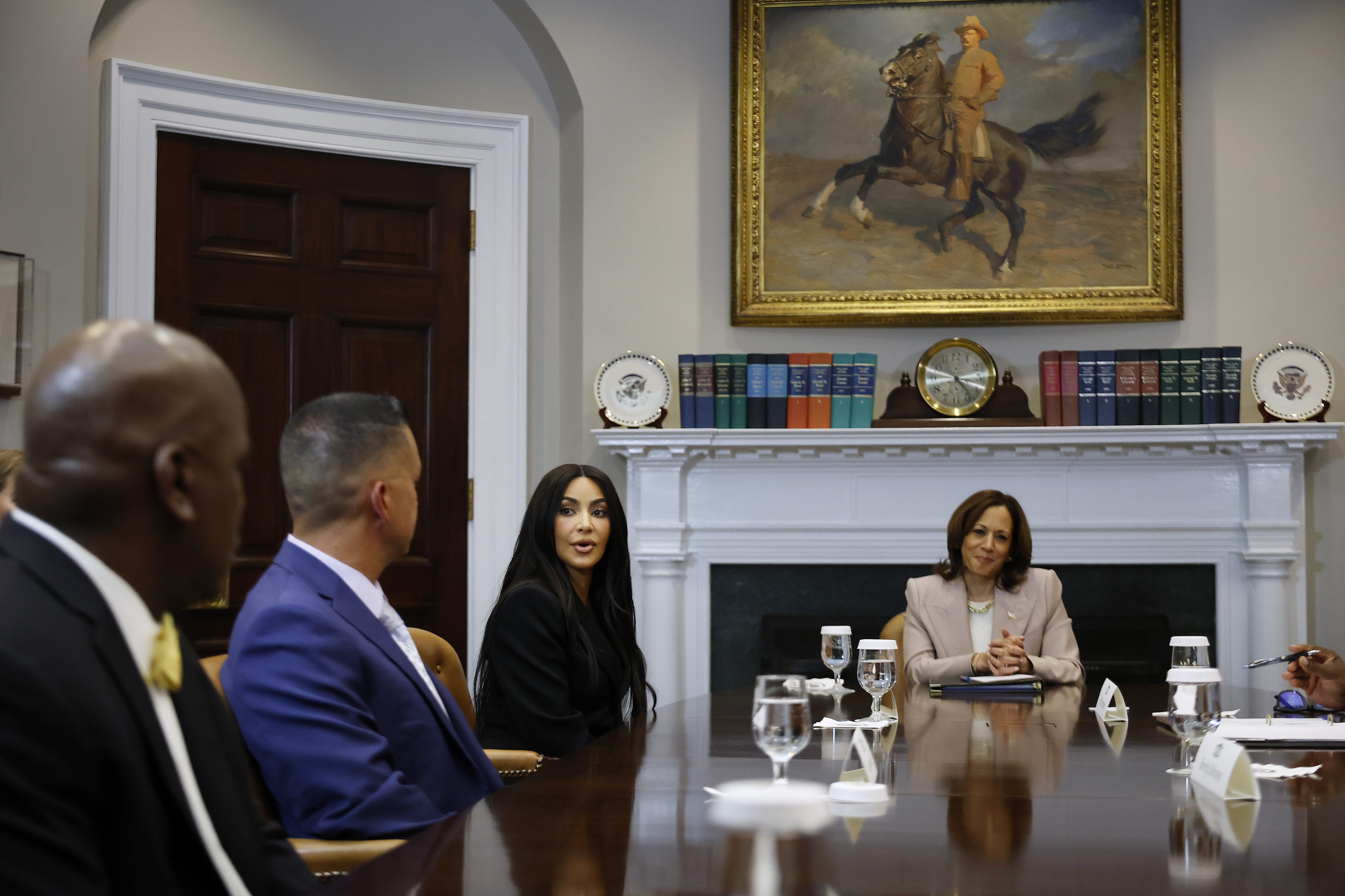 Kim pictured with dark hair during her meeting with Vice President Kamala Harris