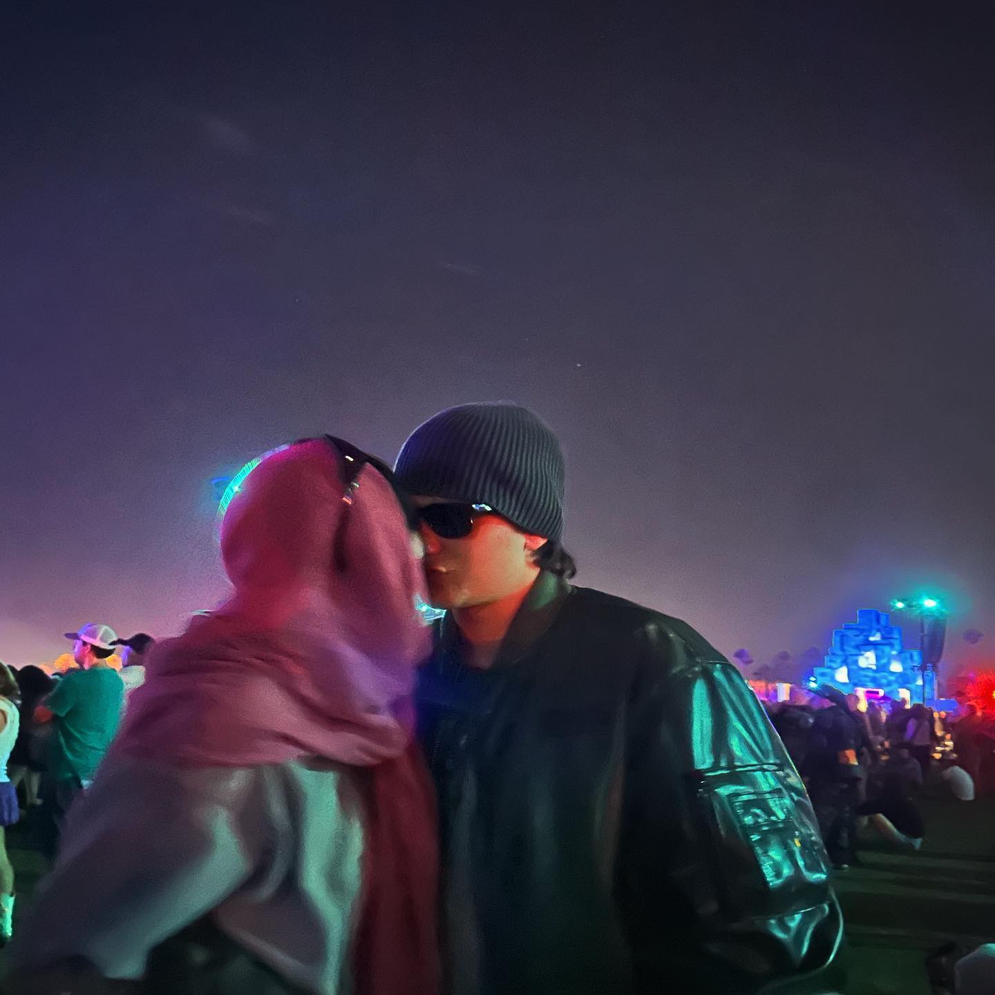 The up-and-coming musician shared a couple of photos of her kissing her fiancé, Pinkus
