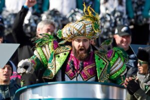 Jason Kelce speaks during the Eagles' Super Bowl victory parade in front of the Philadelphia Museum of Art
