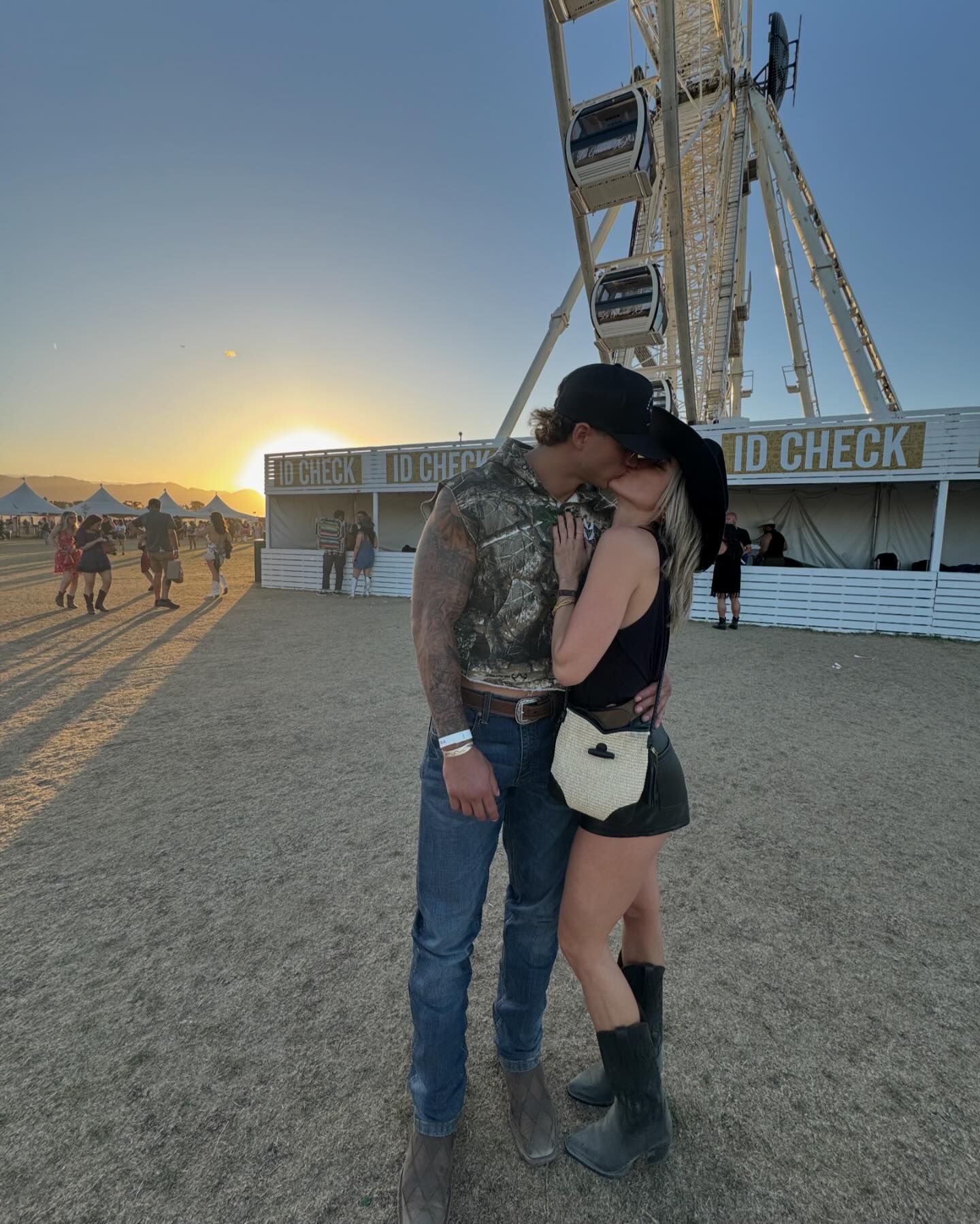 The couple was seen wearing matching cowboy hats and boots as they attended the country music festival together