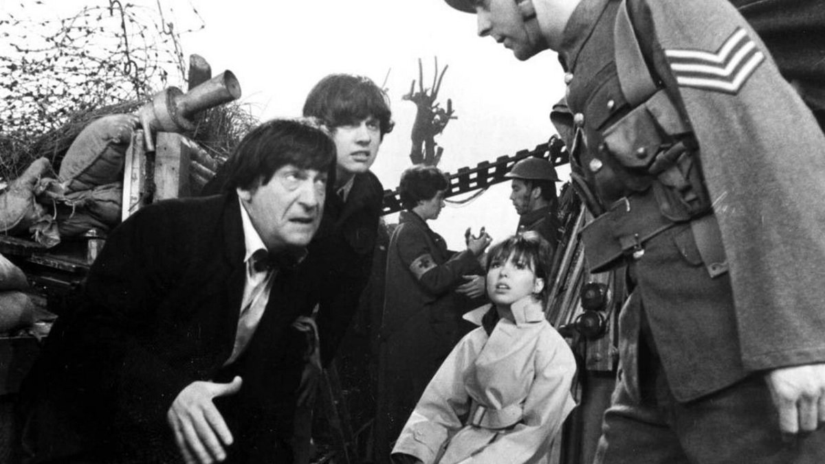 The Doctor, Jamie, and Zoe are surrounded by WWI soldiers in the historical-adjacent story The War Games.