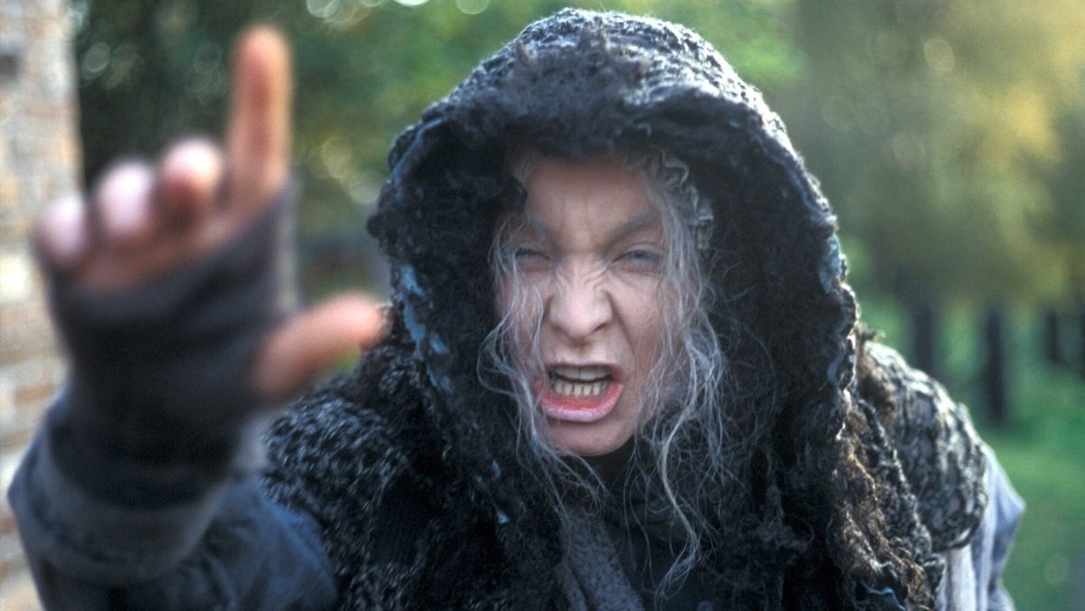 The Rani dresses as a haggard witch who shouts into the camera in the historical Doctor Who story, The Mark of the Rani.