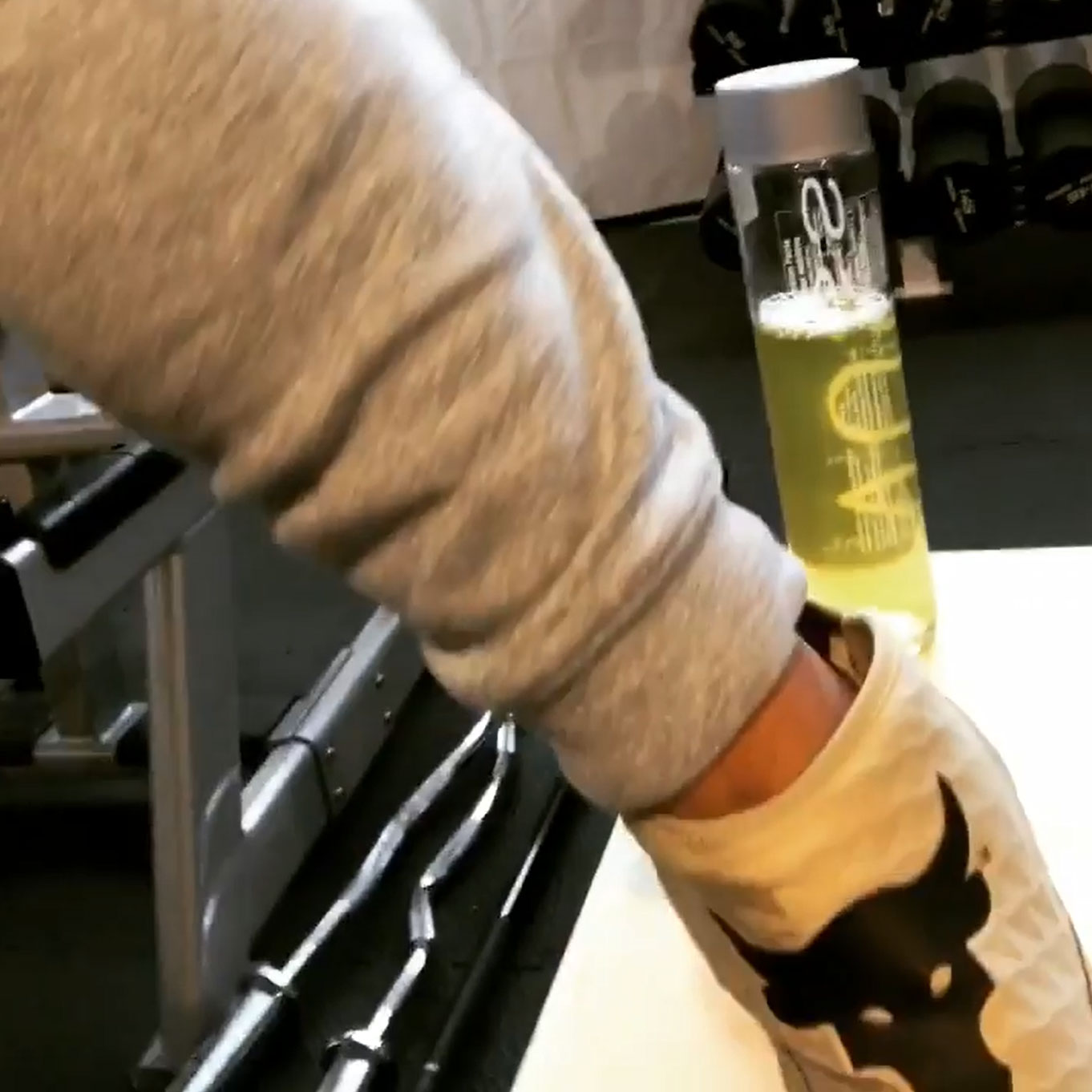 He inadvertently showed off one of the full bottles during a workout