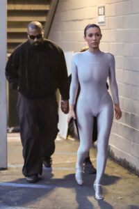 Bianca Censori wore a skintight silver catsuit during an outing with her husband, Kanye West, and his kids