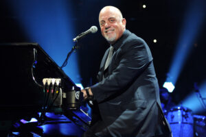 Billy Joel performs onstage celebrating his 65th birthday at Madison Square Garden on May 9, 2014 in New York City