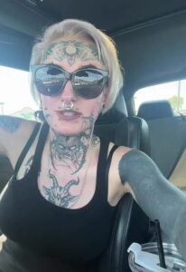 A woman has opened up about the realities of being covered in tattoos