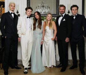 David and Victoria Beckham posed for her birthday surrounded (l-r) by Cruz, 19, Romeo, 21, Harper, 12 and Brooklyn, 25