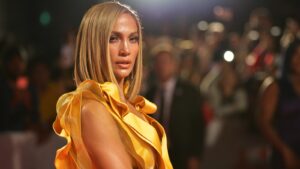 Jennifer Lopez wearing a gold dress