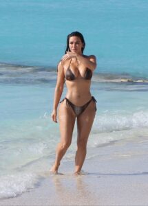 Kim and Khloe Kardashian's real stomachs and butts have been revealed in new, ultra-rare unedited snapshots