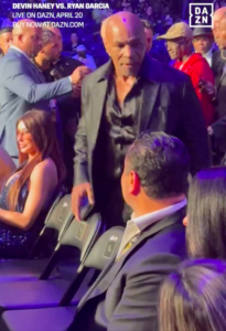 Mike Tyson takes his seat at the Barclays Center