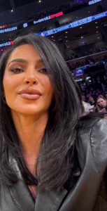 North West revealed her mom Kim Kardashian's real skin in unflattering lighting while the pair attended a Los Angeles Lakers game