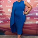 Ashanti showed off her baby bump while at an event on Wednesday