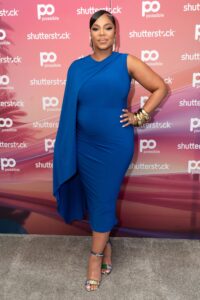 Ashanti showed off her baby bump while at an event on Wednesday